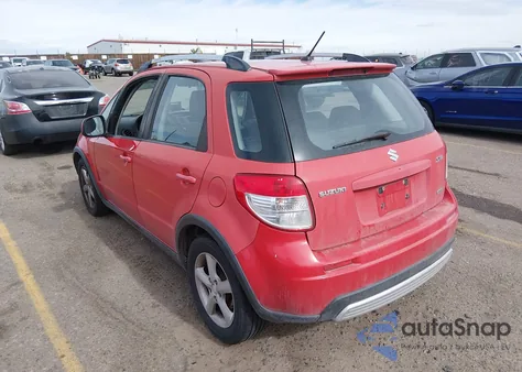 2009 Suzuki Sx4 Touring z USA, uszkodzony, nr VIN JS2YB417195101005